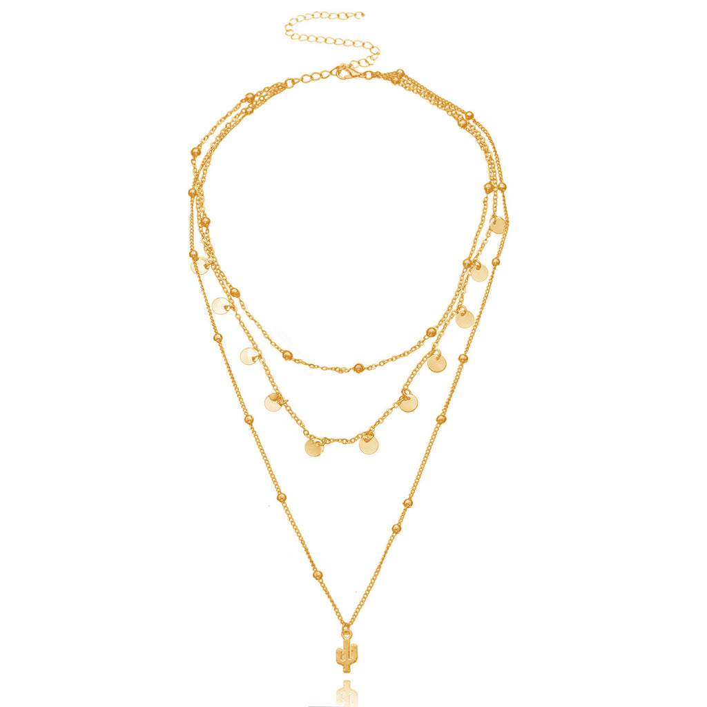 A multi-layered necklace featuring a round cactus pendant and a women's round bead chain
