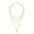 A multi-layered necklace featuring a round cactus pendant and a women's round bead chain