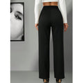 This is a pair of high-waisted straight-leg black high-end drape trousers for spring and autumn, paired with a belt