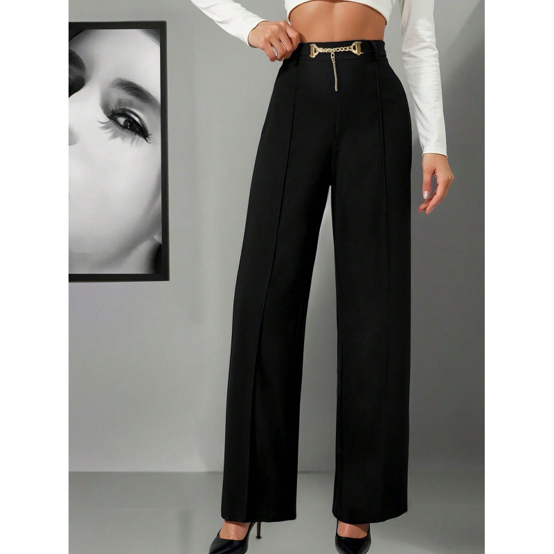 This is a pair of high-waisted straight-leg black high-end drape trousers for spring and autumn, paired with a belt