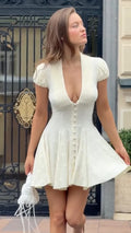 Elegant Polka Dot Mini Dress – Deep V Neck